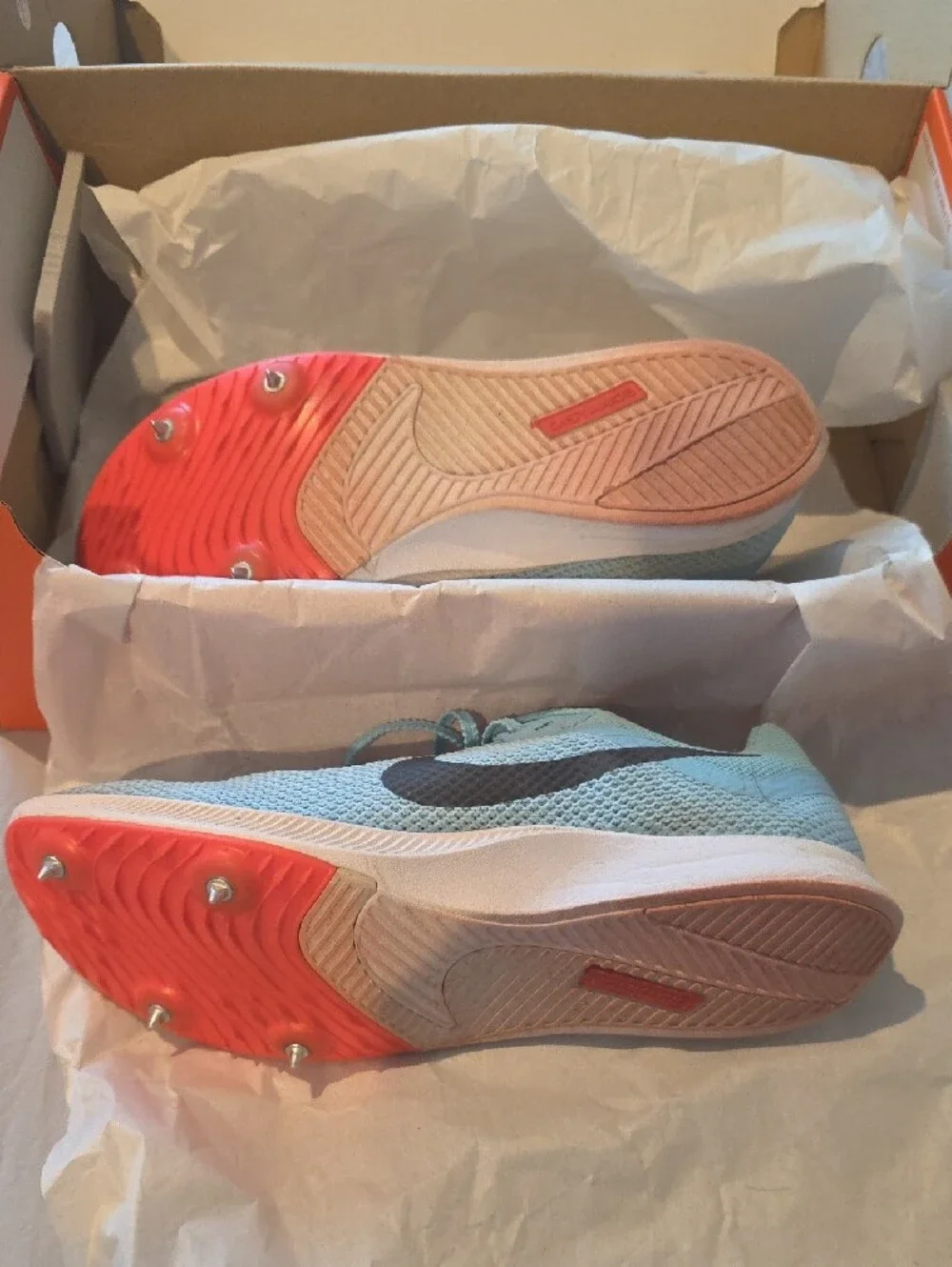 Nike Women's Light Blue Mesh Running Shoes with Black Swoosh